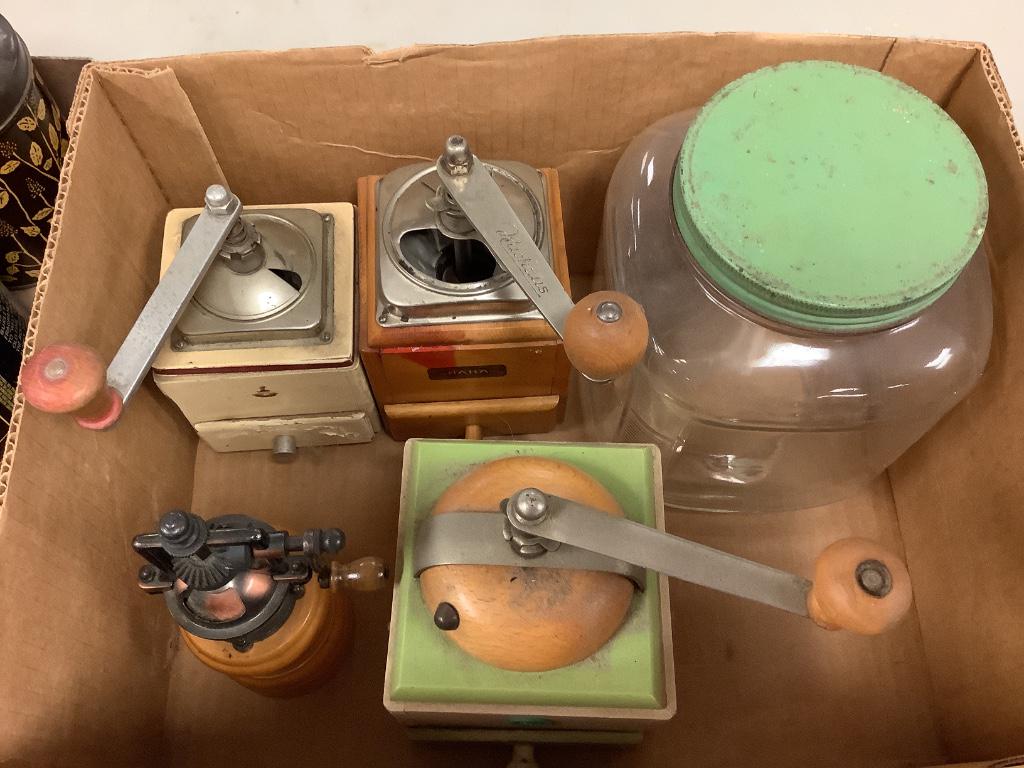 Box lot including four coffee mills and glass jar. (1 of 1)