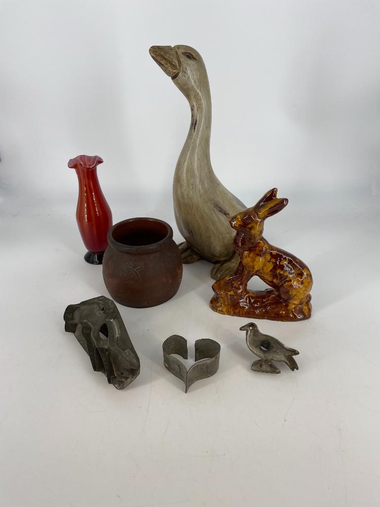 Box including duck, cookie cutters, and pottery rabbit: Box including duck, cookie cutters, and pottery rabbit