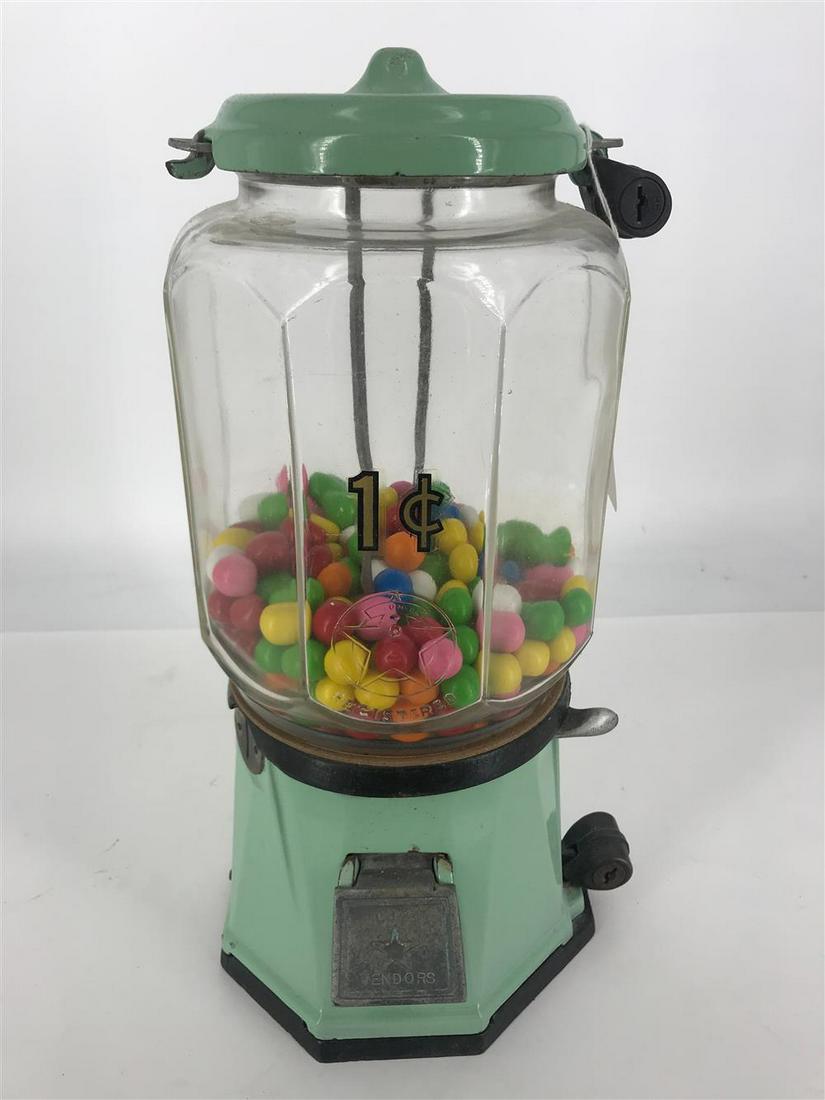 14Â¼" MINT GREEN GUMBALL MACHINE FROM COLUMBUS VENDORS. (1 of 2)