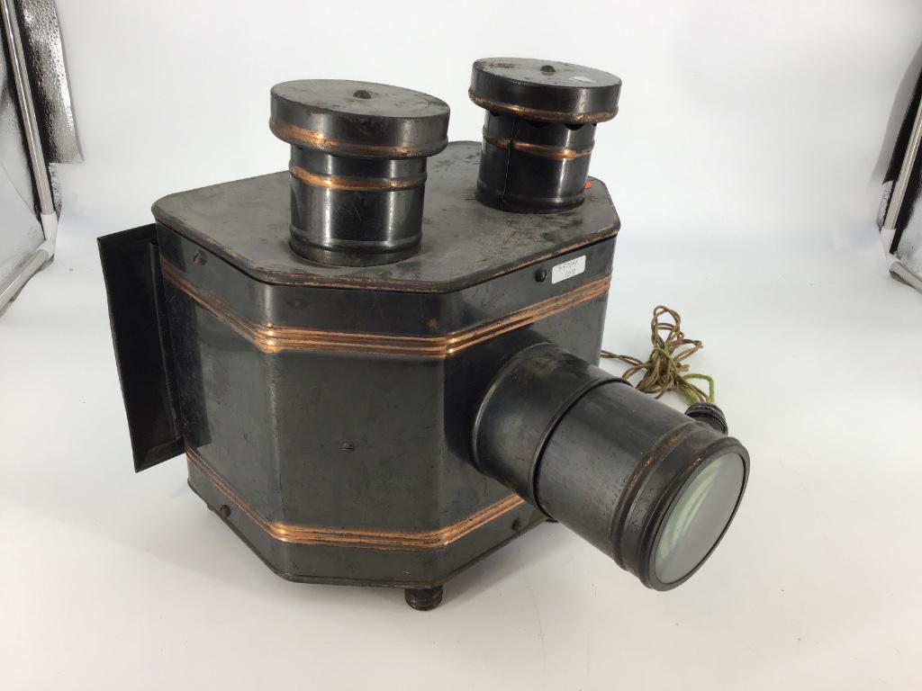 Antique stereoptican projector.: Antique stereoptican projector.
