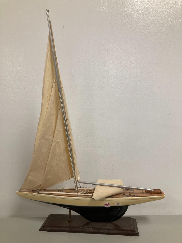 Wooden model of sailboat, 25â€ long.: Wooden model of sailboat, 25” long.
