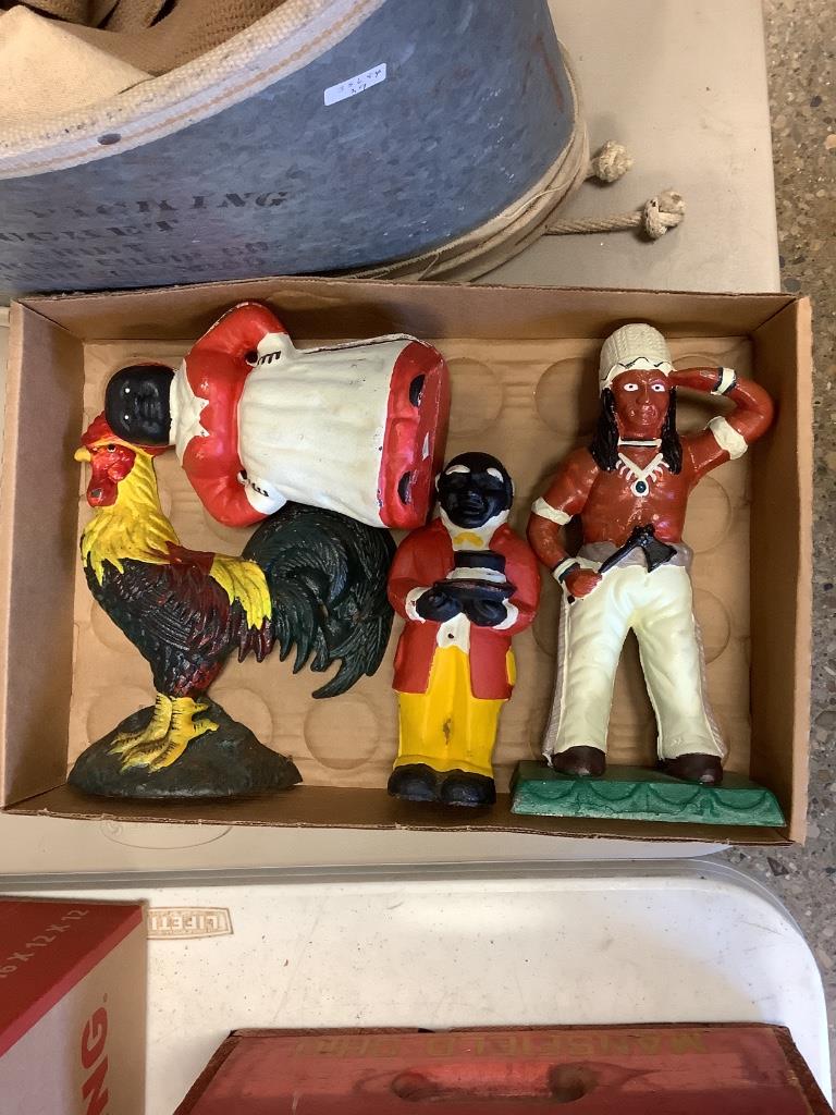 Box lot reproduction cast iron doorstops including: Box lot reproduction cast iron doorstops including Indian and black memorabilia.