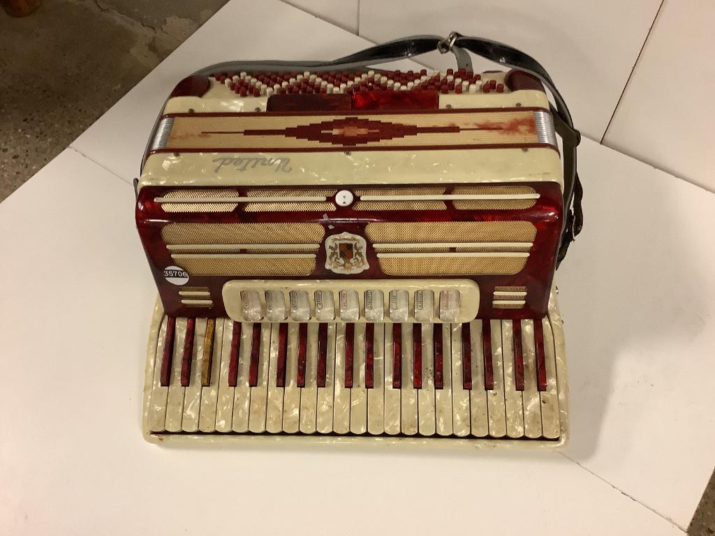 Antique accordion, red and ivory (1 of 1)