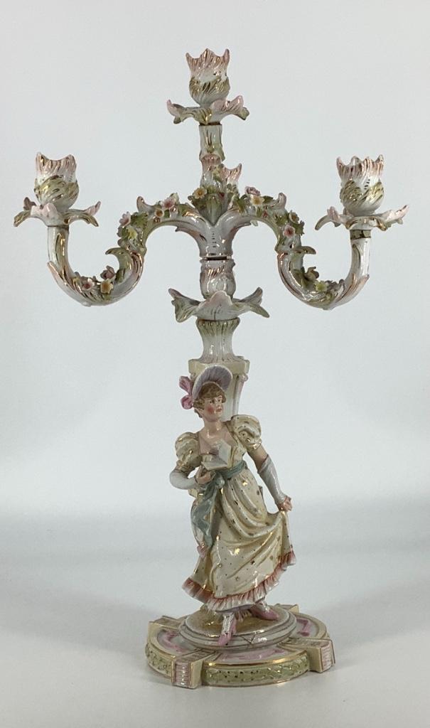 Dresden type four light candelabra with figure of young: Dresden type four light candelabra with figure of young lady with book. May have slight damage.