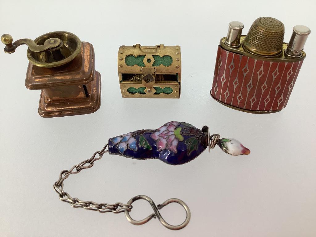 Box lot of sewing accessories including a coffee: Box lot of sewing accessories including a coffee grinder tape measure, treasure chest swing kit and a lighter needle and thimble kit.