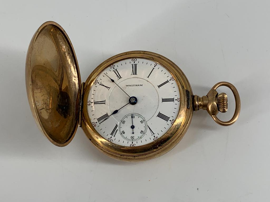 Waltham Pocket Watch: Waltham Pocket Watch Hunter movement configuration. Winds, sets and ticks at time of listing. Lever set movement. Gold-filled (guaranteed) "the winner" case (hinged). 17-jewel adjusted movement number