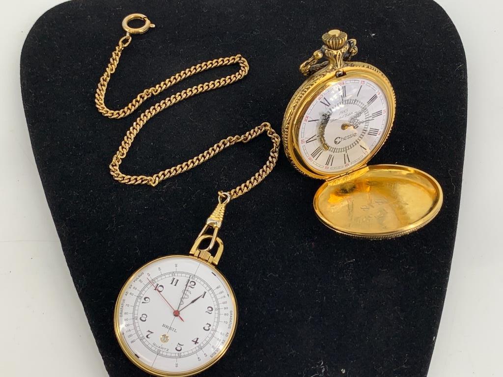 Two Modern Pocket Watches: Two Modern Pocket Watches Chessie pocket watch with hinged case (circa 1985 with high relief train motif) no. 1252/1848. Battery operated movements. Breil pocket watch (42.0mm case diameter) with whit