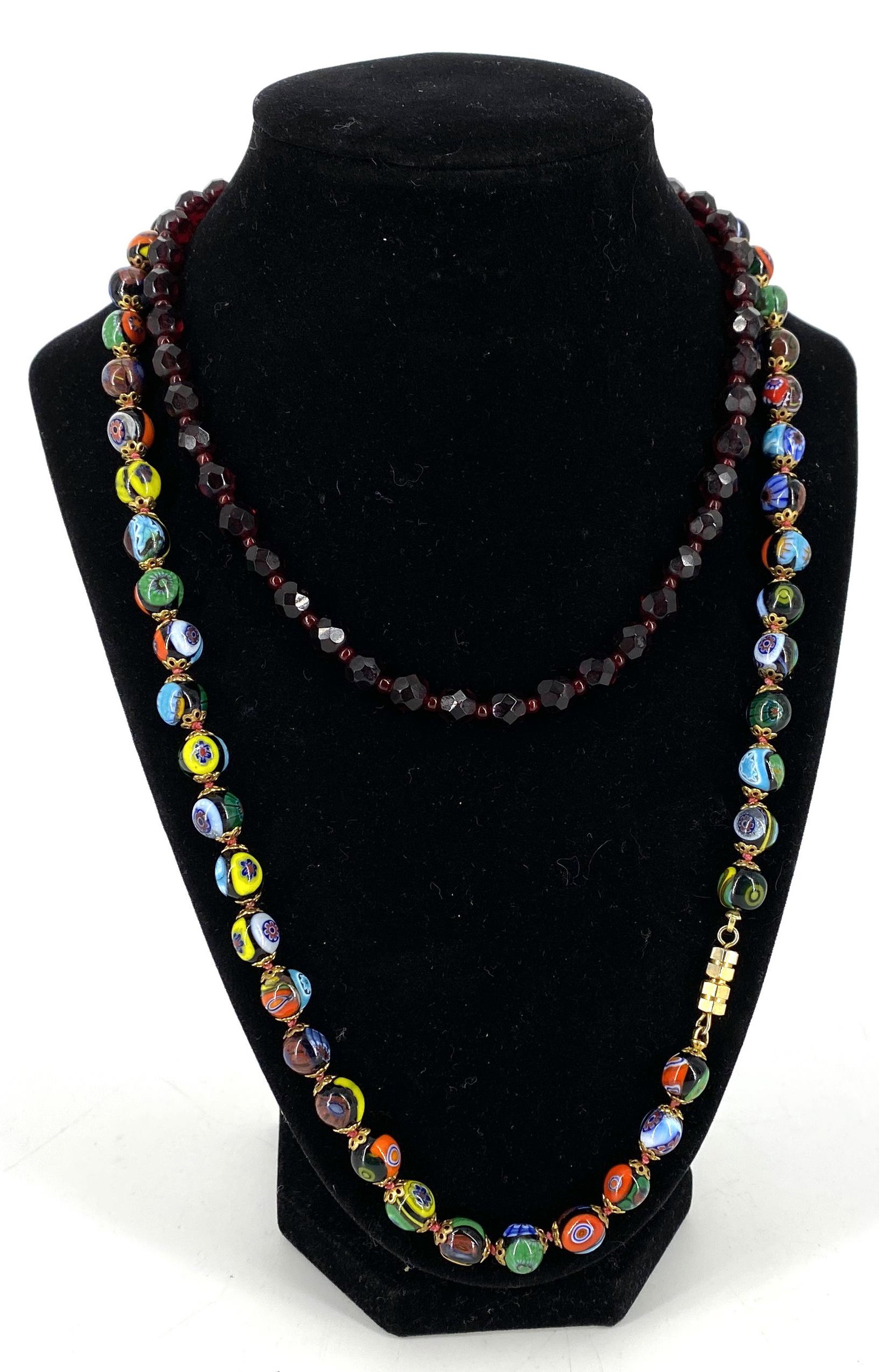 Two Vintage Necklaces: Two Vintage Necklaces 16" choker length faceted garnet (or glass) bead necklace with spring ring clasp (6.75mm - 7.25mm beads). 23" matinee length Italian made glass bead necklace (multi-colored) feat