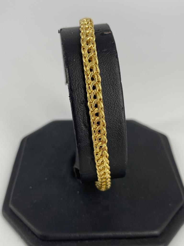 14kt Yellow Gold Bracelet: 14kt Yellow Gold Bracelet 8.125” in length, (approx 4.5mm wide) chain featuring tightly woven fine circular links, made in Peru, stamped & tested with lobster clasp closure (3.34 grams tw)
