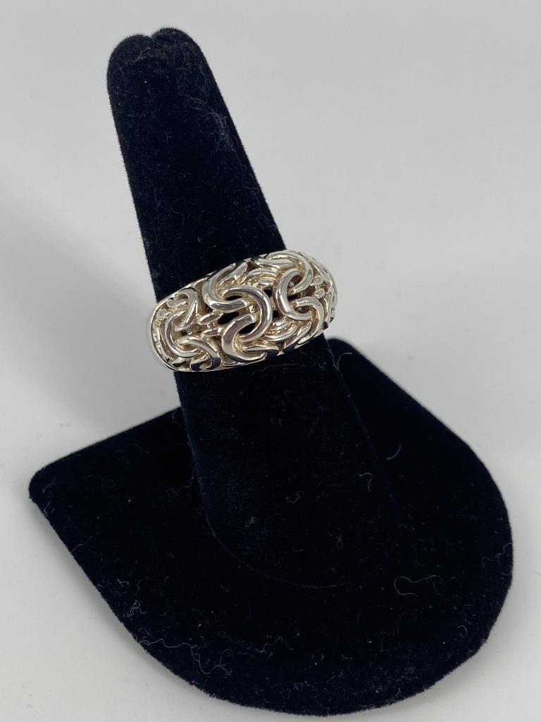 Sterling Silver Fashion Ring: Sterling Silver Fashion Ring Size 7.75 tapered shank design featuring an openwork byzantine style design with polished finish, stamped and tested (0.3 troy oz tw)