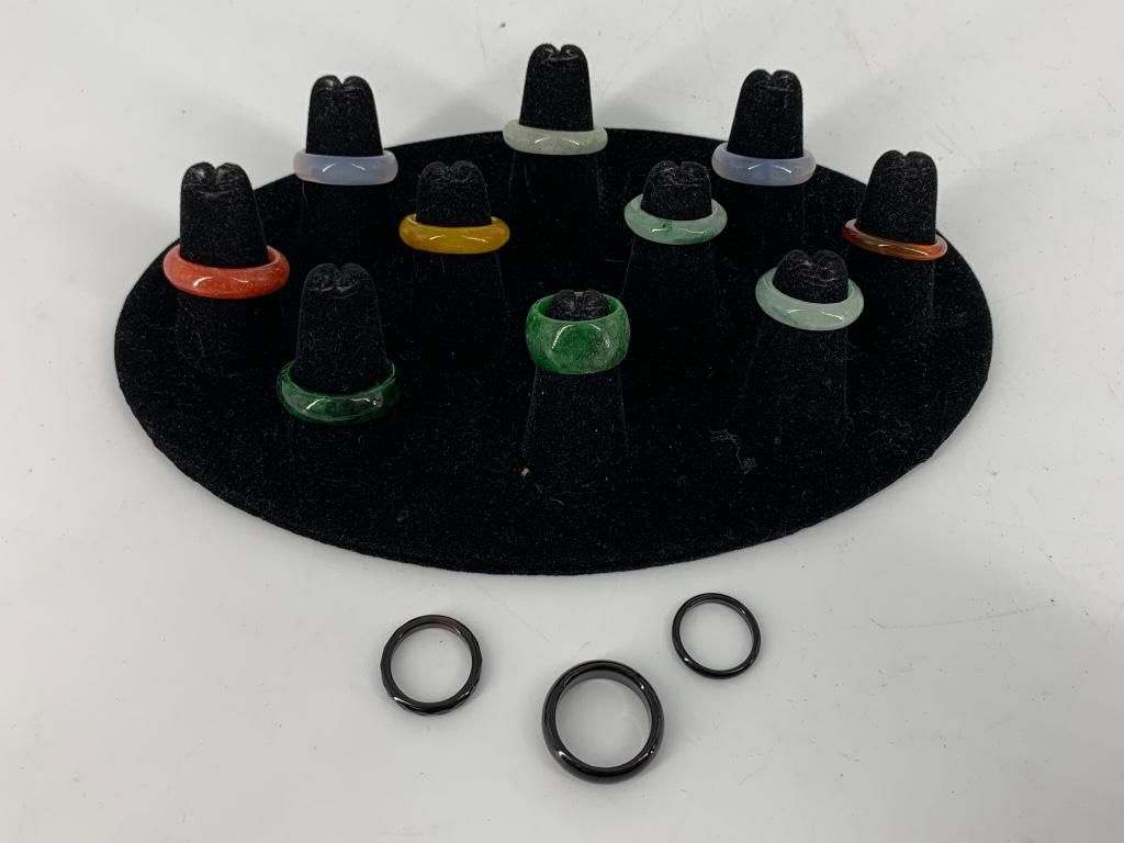 Lot of Carved Stone Rings: Lot of Carved Stone Rings Thirteen in total, mostly jade stone rings (some dyed), sizes 2.5 - 9. Polished finishes, in good condition at time of listing. Straight shank styles, unknown ages/makers.