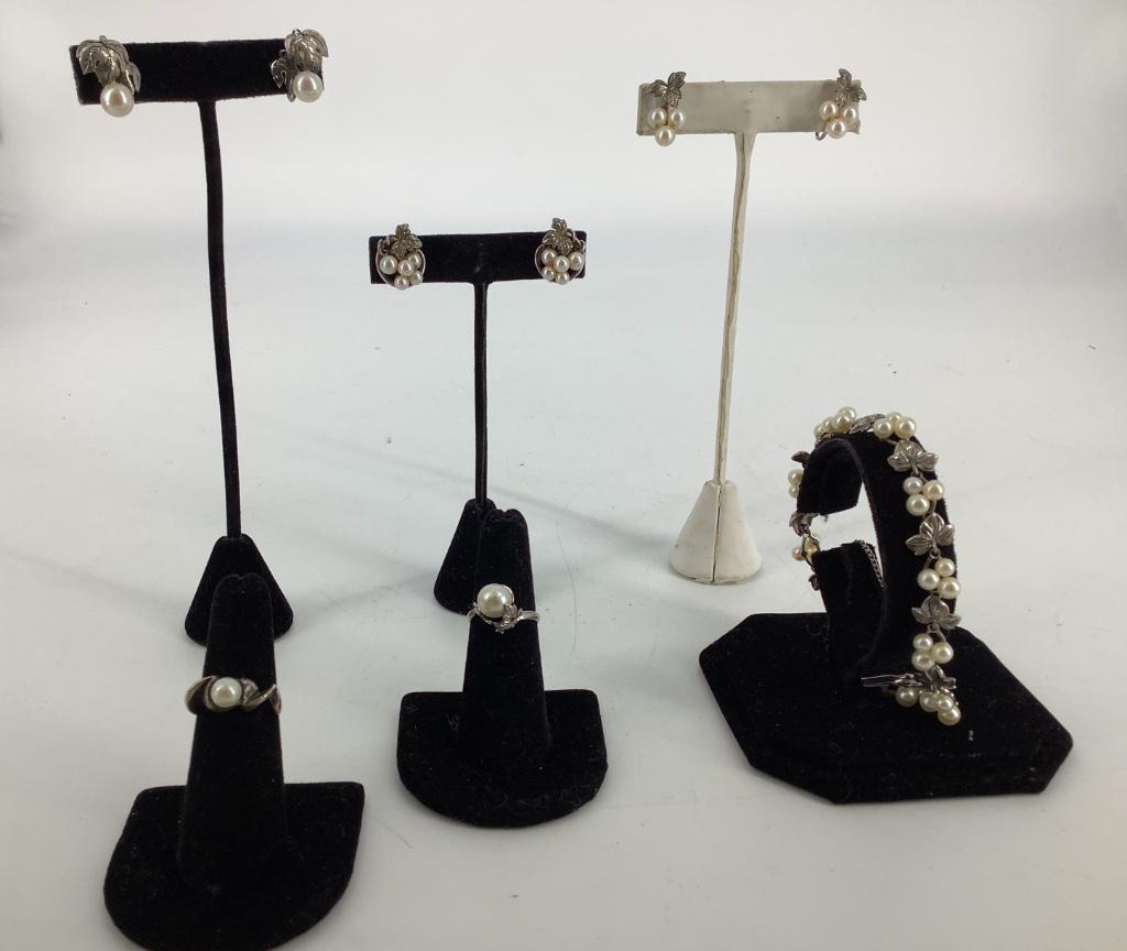 Pearl, Faux Pearl, Silver Plate and Sterling Jewelry: Pearl, Faux Pearl, Silver Plate and Sterling Jewelry Lot Silver plate and faux pearl cluster screwback earrings with natural motif, two silver and faux pearl rings both size 5.75. Sterling silver brac