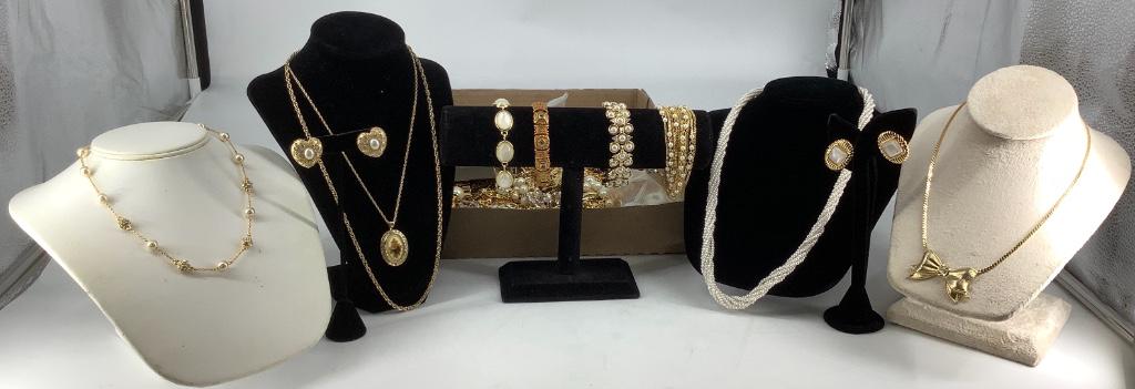 Box Lot Gold Tone Accessories: Box Lot Gold Tone Accessories Multiple styles and designs including 18” polished neckalce from Trifari with polished heart links, several curb, herringbone and spiral chain necklaces, 1.75&rdquo