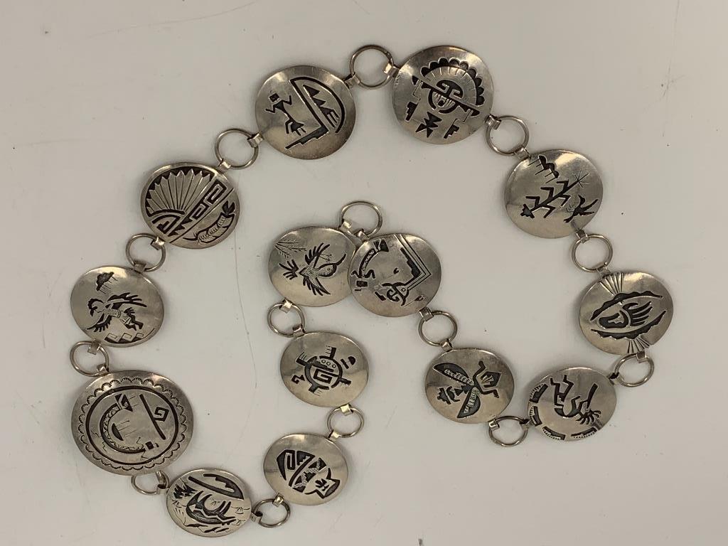Sterling Silver Belt: Sterling Silver Belt Southwestern style, each link featuring different Native American design including figural and animal motifs, signed "LMY", stamped and tested as sterling silver, links measure be