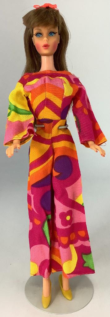 Brownette Twist & Turn Barbie. Doll is wearing #1806: Brownette Twist & Turn Barbie. Doll is wearing #1806 "Pajama POW", in unplayed-with condition, hair in original set, retains hair bow, nail and facial paint excellent, retains all toenail polish, knee