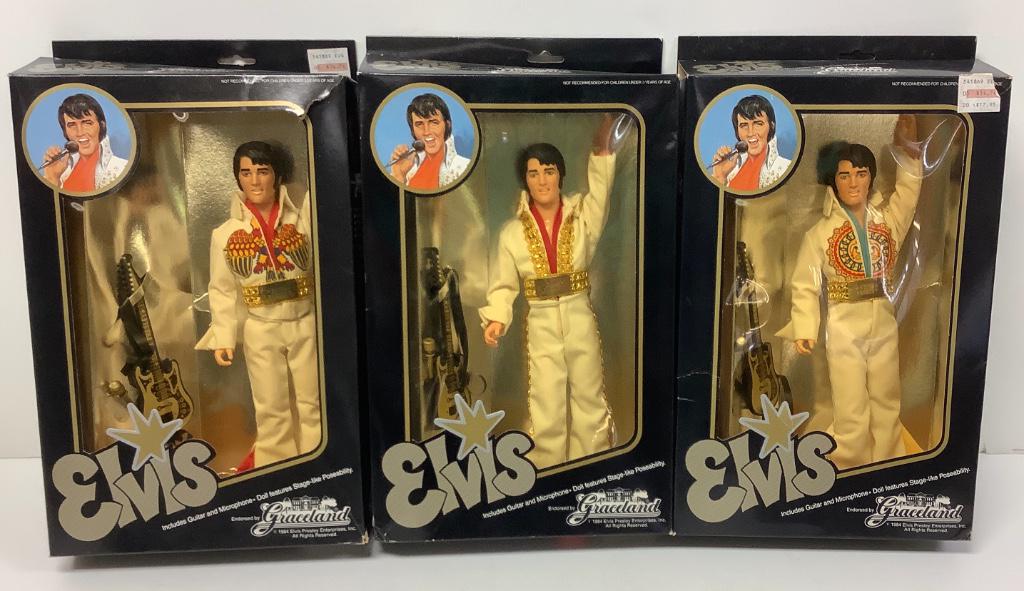 (3) Elvis dolls by Eugene Doll Co.endorsed by Graceland: (3) Elvis dolls by Eugene Doll Co.endorsed by Graceland in original boxes; each with guitar and microphone. Dolls are loose in box.