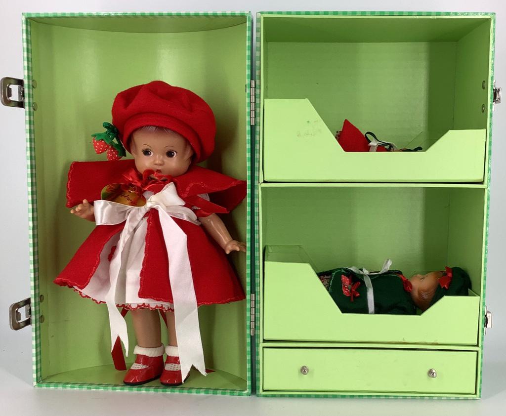 Effanbee "Patsy Family Trunk Set" with 13" Patsy, 8": Effanbee "Patsy Family Trunk Set" with 13" Patsy, 8" Patsyette and 5" Wee Patsy in green and white check dome top trunk. All wear coats, hats and dresses with strawberry motif.