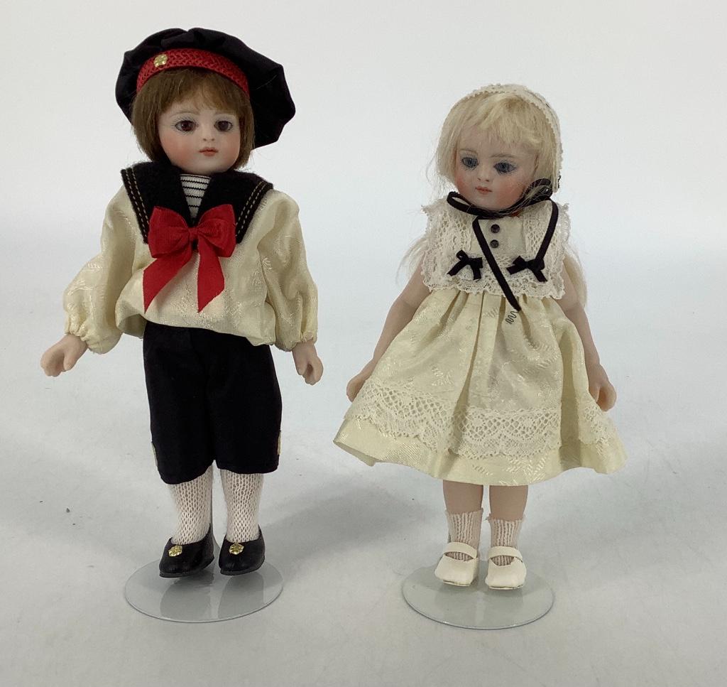 Pair 5 1/2" artist made boy and girl all bisque dolls: Pair 5 1/2" artist made boy and girl all bisque dolls by Darlene Lane. Made for the 2011 UFDC Convention in Anaheim, California, "Aimee" and her companion "Andre" have mohair wigs, stationary glass ey