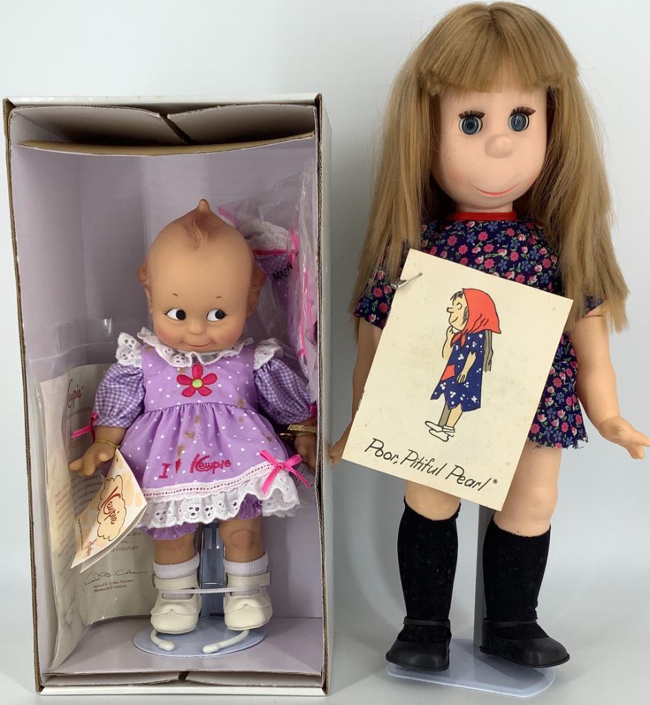(2) vinyl dolls including 16" Horsman "Poor, Pitiful: (2) vinyl dolls including 16" Horsman "Poor, Pitiful Pear" reproduction with story book and 12" Effanbee Kewpie Lavender "I Love Kewpie" in original box. Kewpie has stains on dress.