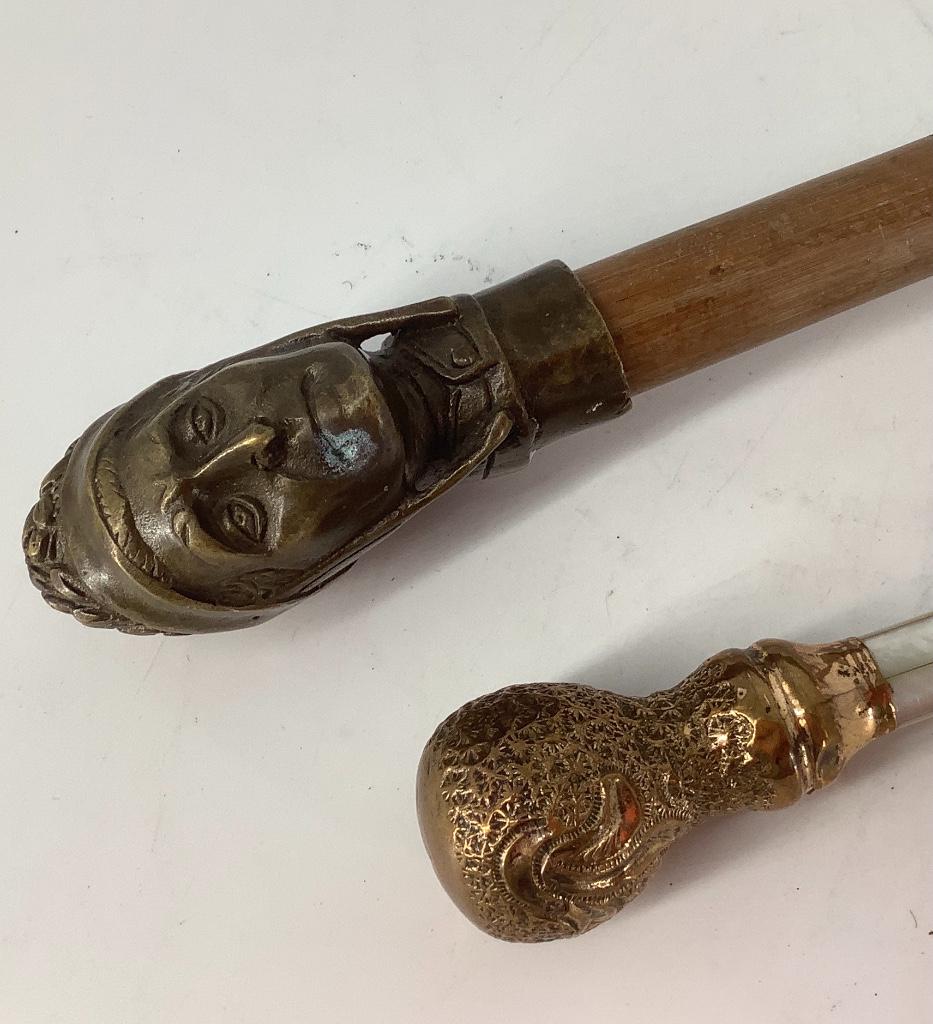 Metal head figural walking stick and gold filled with (1 of 2)