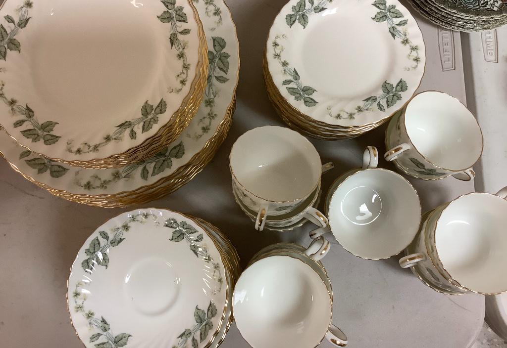 Minton Bone China. 13 plates 10-3/4", nine salad: Minton Bone China. 13 plates 10-3/4", nine salad plates, 12 saucers, 16 dessert plates and 13 cups.