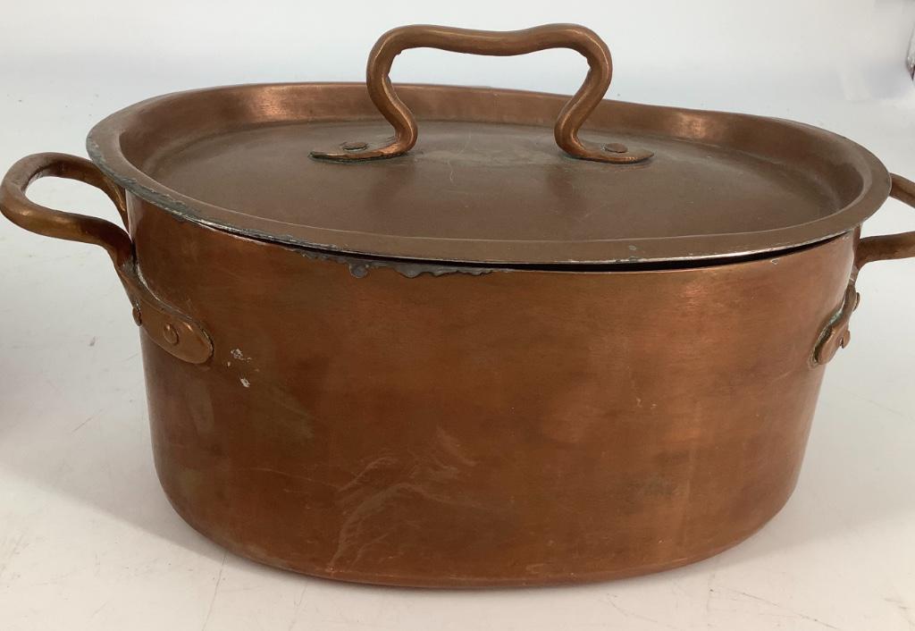 Copper pan . Lid doesn’t level.height 5” length 9”. (1 of 1)
