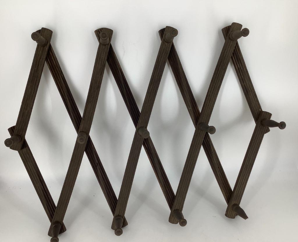 Wooden folding hat rack. 52" x 12" when opened to (1 of 1)
