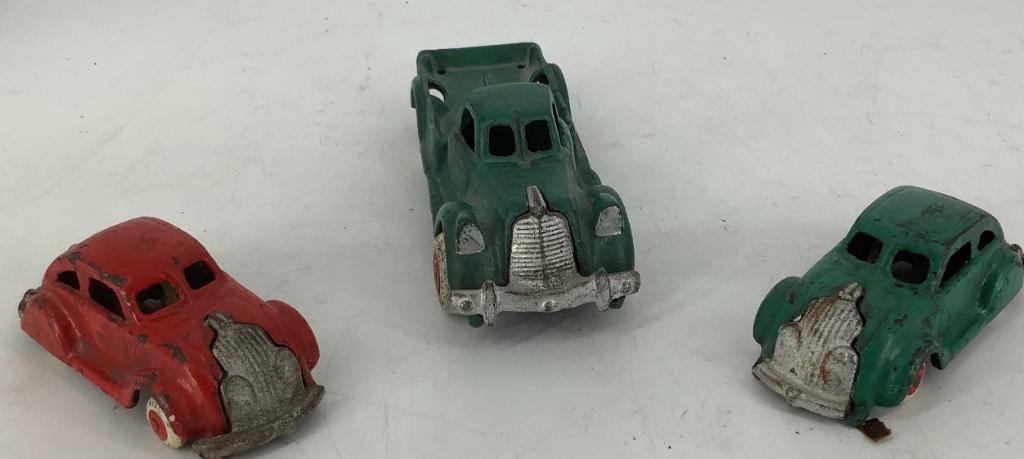 Three cast iron toy cars (1 of 2)