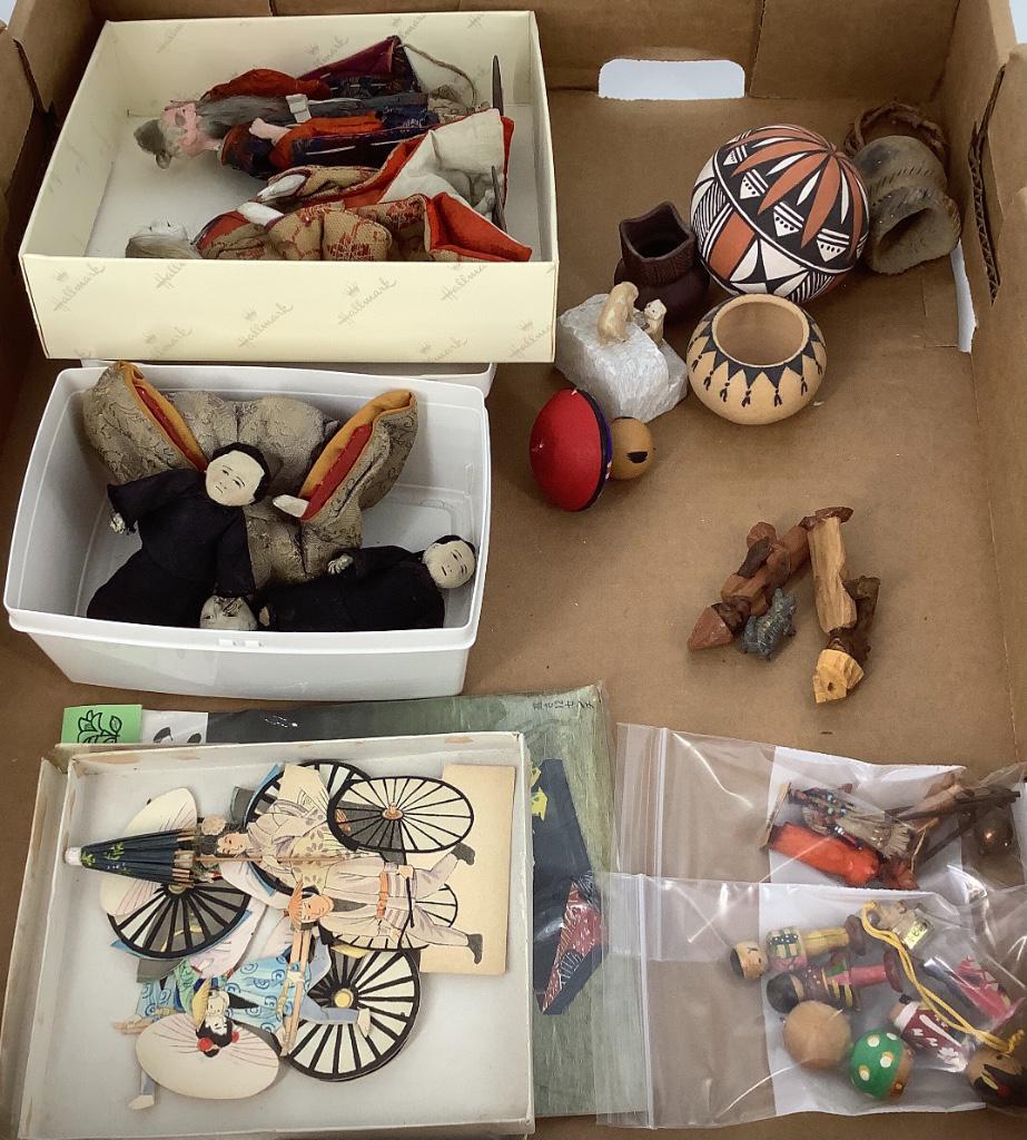 Assortment of Asian dolls and pottery. (1 of 1)