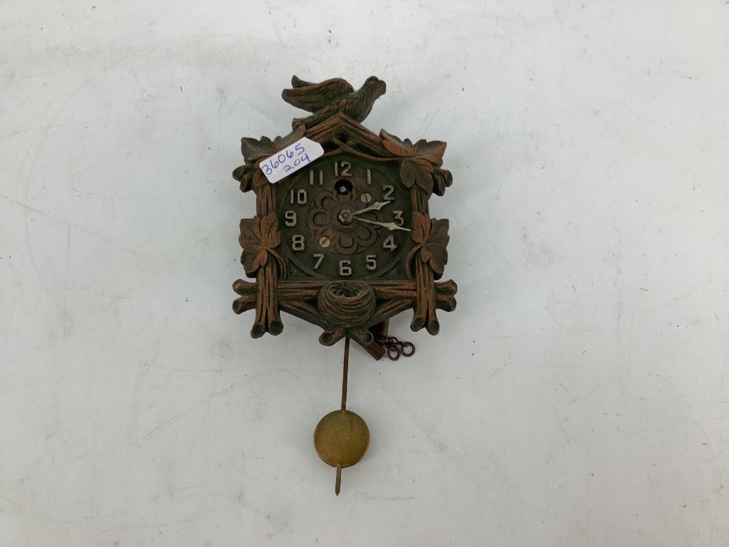 Small lux type clock miniature no key 4"H (1 of 2)