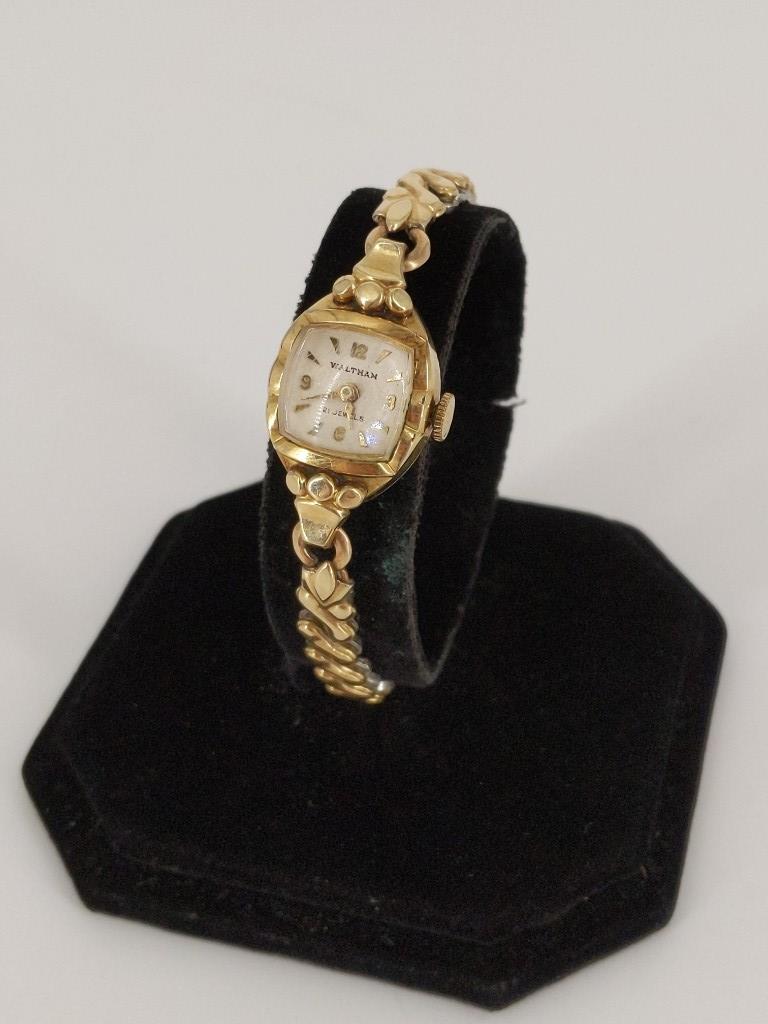 Ladies' Waltham 21-Jewel Wrist Watch: Ladies' Waltham 21-Jewel Wrist Watch 10kt rolled gold plate bezel and gold-filled caps on stretch band. Winds, sets and ticks at time of listing. Gold tone hands/indicators with tapered shape. Model 6
