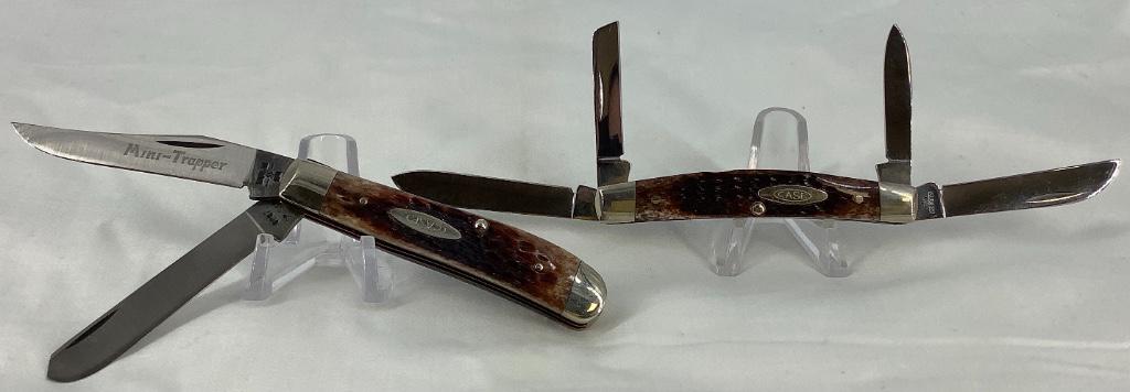 Lot of Two Case XX Folding Knives: Lot of Two Case XX Folding Knives Two folding knives ft. steel clip point, spay, skinner, drop point and pen knife blades, made in the USA by Case, jigged bone handles, models 6207 SP SPP (Mini-Trappe