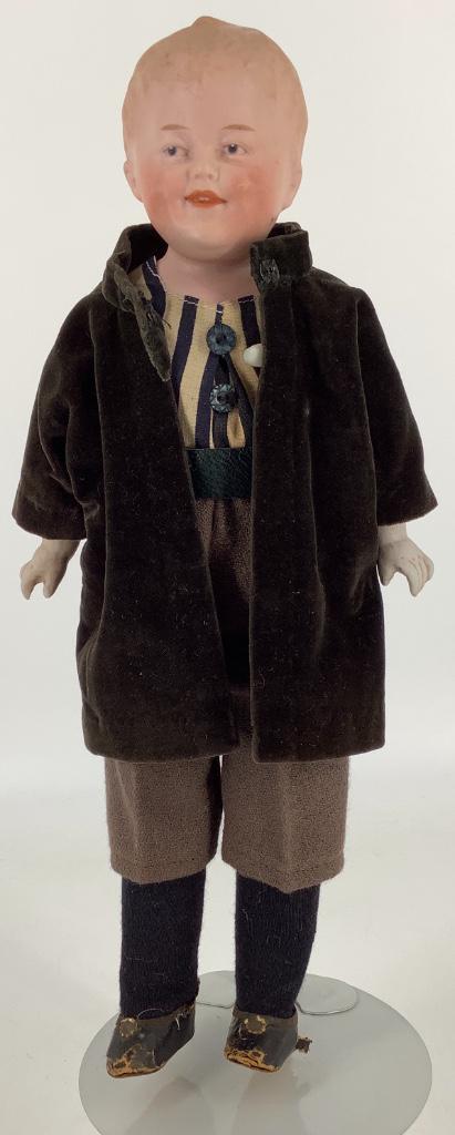 12" Gebruder Heubach 8724 bisque shoulder head: 12" Gebruder Heubach 8724 bisque shoulder head character boy. Solid dome head with molded and painted hair and facial features, intaglio eyes, closed mouth with molded teeth, on stitch jointed cloth b