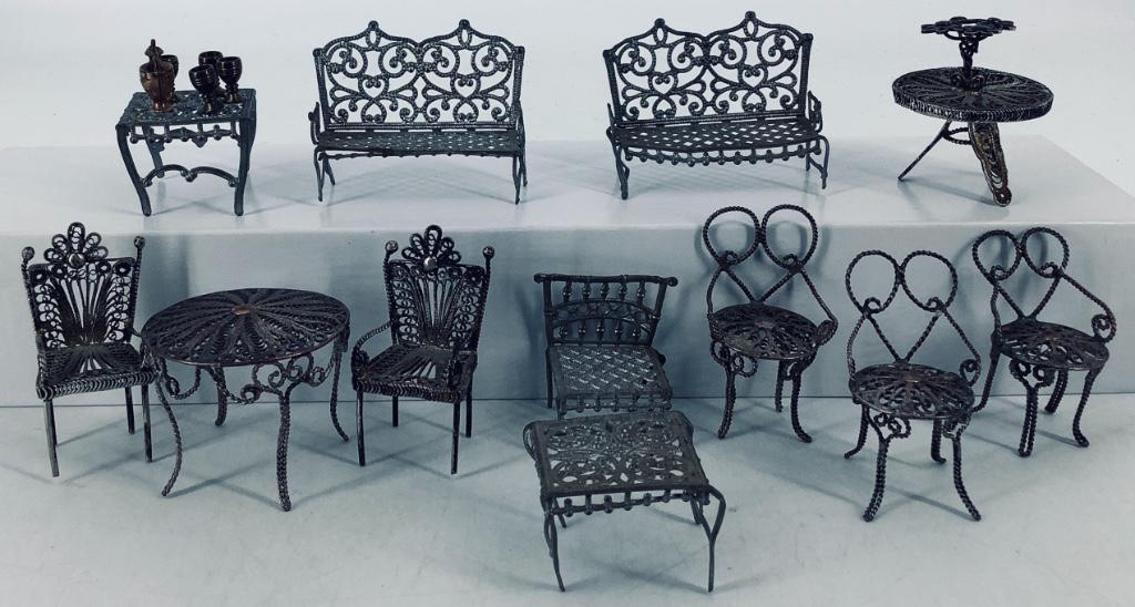 Lot miscellaneous small scale soft metal dollhouse: Lot miscellaneous small scale soft metal dollhouse furniture. Settees measure 2" wide, 1 1/2" high, 1" deep. One settee missing front trim.