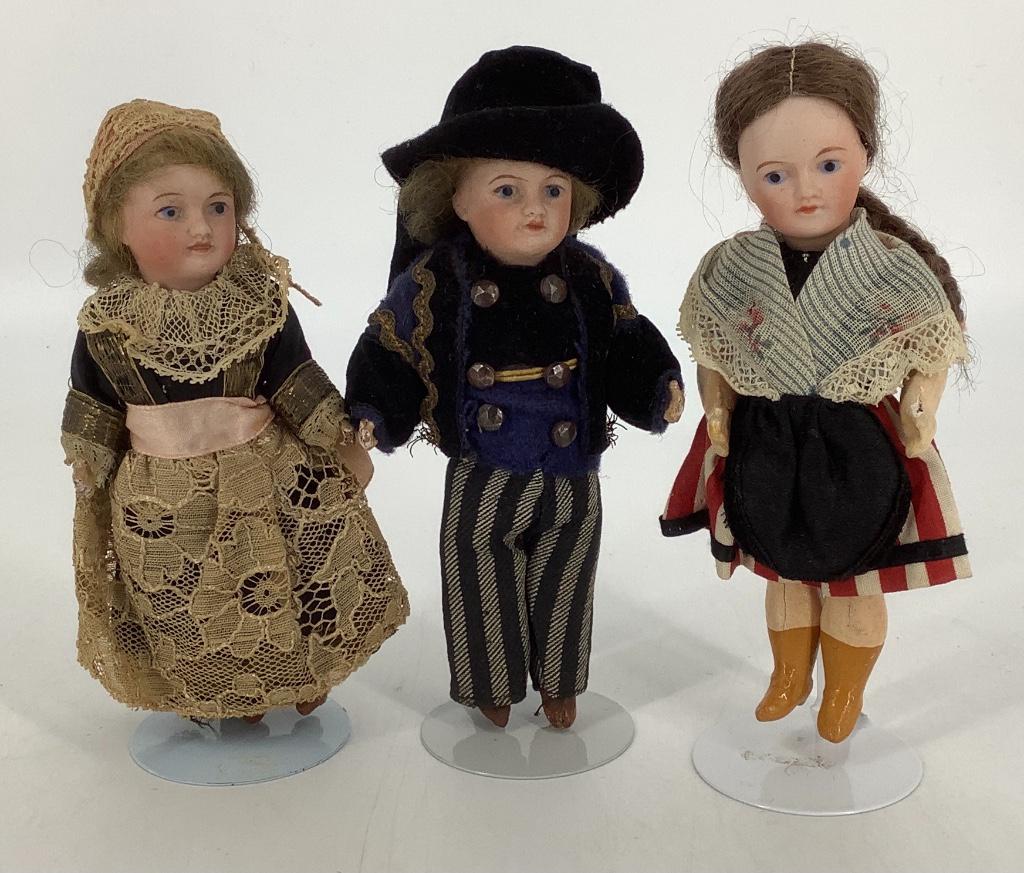 (3) 5" UNIS 301 bisque socket head dolls. All have (1 of 1)