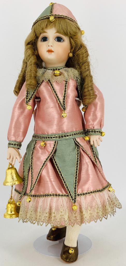 16" artist made all porcelain reproduction closed mouth: 16" artist made all porcelain reproduction closed mouth Jumeau; on jointed body wearing pink and green jester style dress.