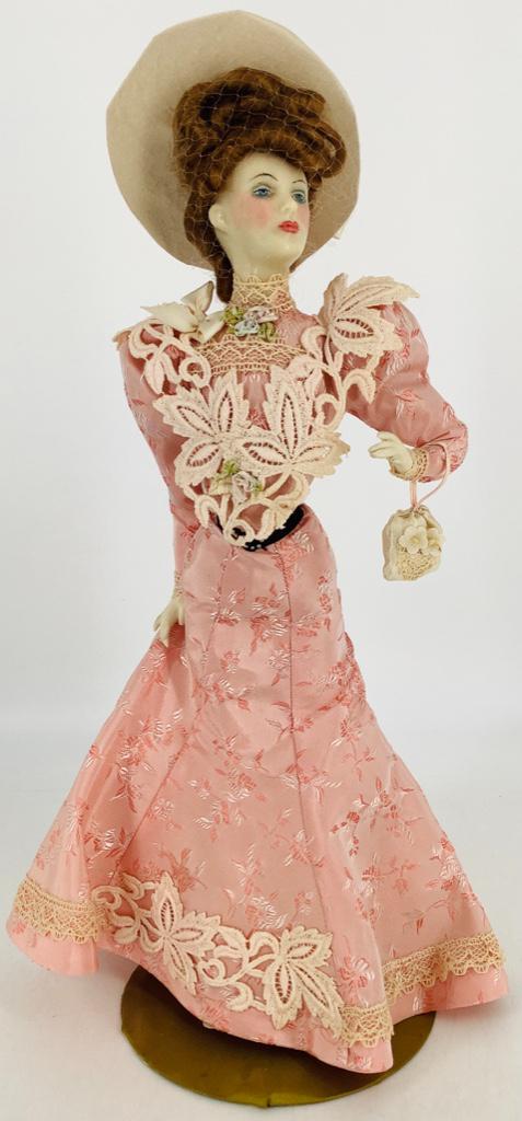 16Â½" (overall) Lewis Sorensen wax portrait doll: 16½" (overall) Lewis Sorensen wax portrait doll "Gibson Summer Girl" in pink brocade; label on right leg of undergarment. Comes with COA; circa 1964.