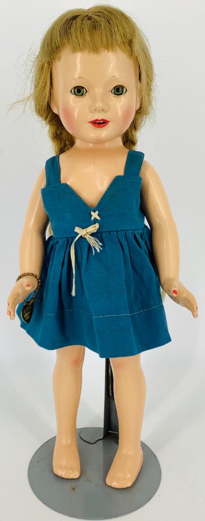 14" vintage composition Effanbee The American Children: 14" vintage composition Effanbee The American Children doll. Human hair wig, sleep eyes and open mouth with teeth; on five-piece body. Arms are made of hard rubber and have separated fingers for weari