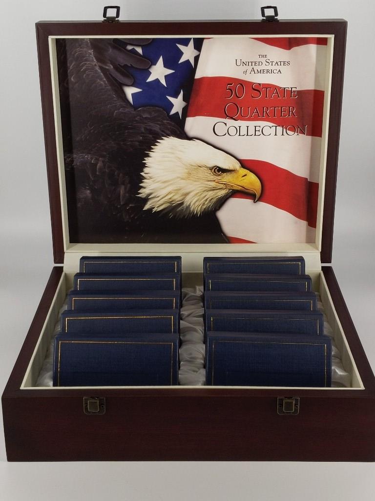 United States 50 State Quarter Collection: United States 50 State Quarter Collection Uncirculated coins, 50 coin set, set does not include the territory quarters, coins dated 1999 - 2008, like new set with original boxes/packaging. In large wo