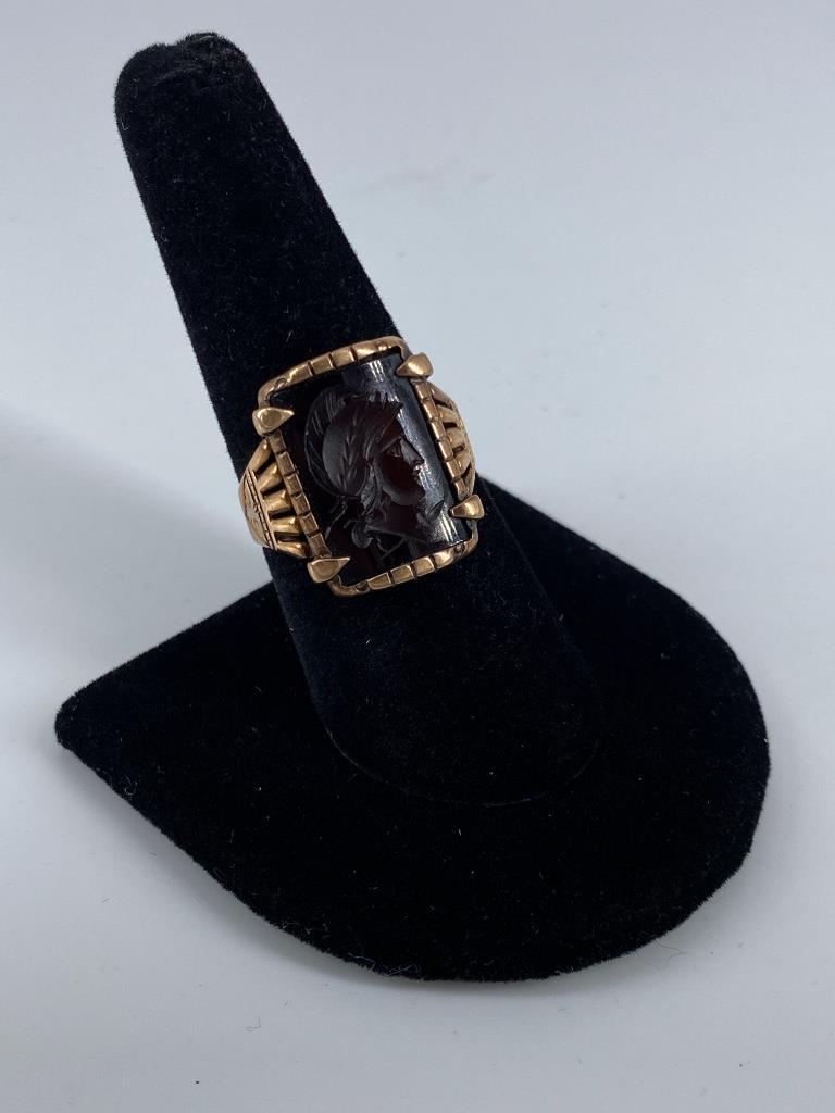 Antique Gold Filled Intaglio Ring: Antique Gold Filled Intaglio Ring Size 8.5 openwork tapered shank ring featuring an embossed scroll motif, onyx intaglio center featuring a portrait of a soldier, interior of ring features a personal 
