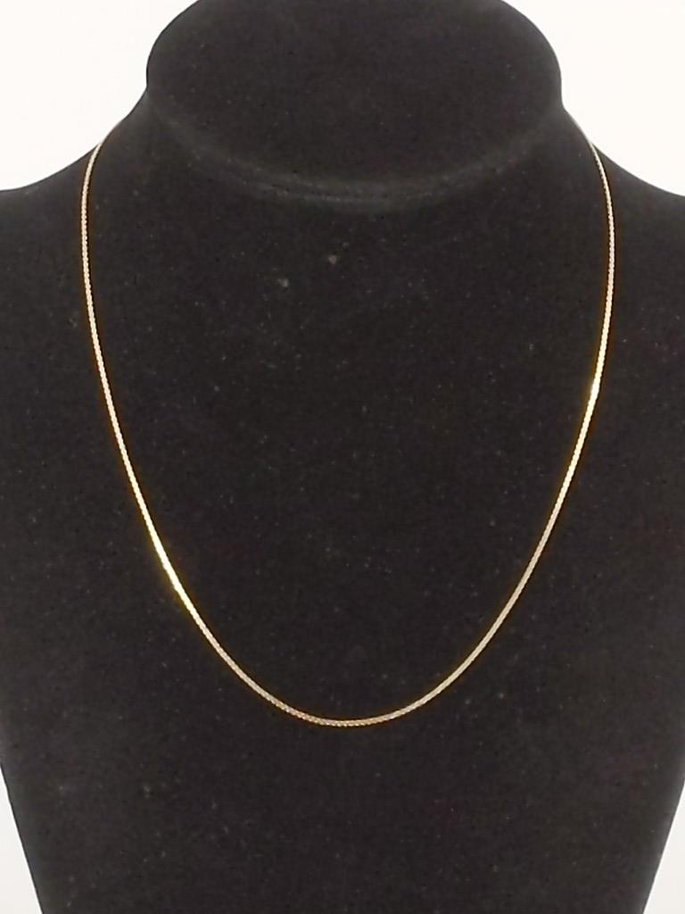 Gold Necklace: Gold Necklace 14kt yellow gold (stamped and tested), Italian made, 14.5" in length (choker), serpentine link chain shape, spring ring clasp/closure, 1.6 grams total weight, 1.0mm chain width.