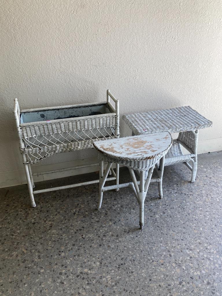 3 wicker outdoor plant stands.: 3 wicker outdoor plant stands.