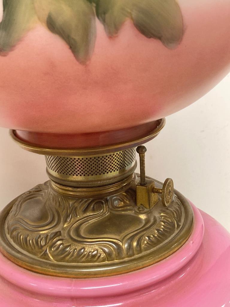 Gone with the wind lamp pink in color with pink and: Gone with the wind lamp pink in color with pink and purple flowers. 27 inches tall.