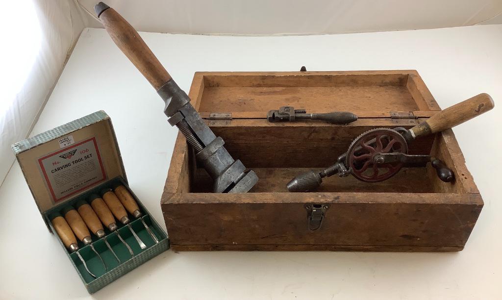 Old wooden tool box with a couple tools and a carving (1 of 3)