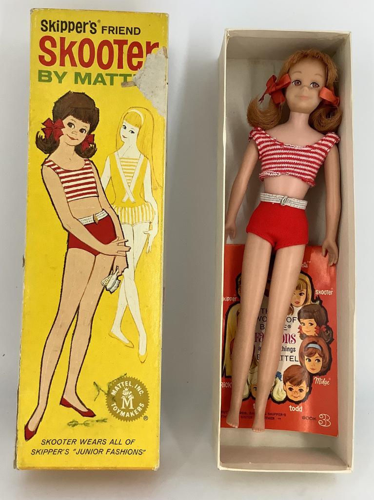 (1) Skooter Doll with her box- her arms are: (1) Skooter Doll with her box- her arms are backwards-missing shoes and stand-the front of her box has a cardboard rip &has writing all over the box