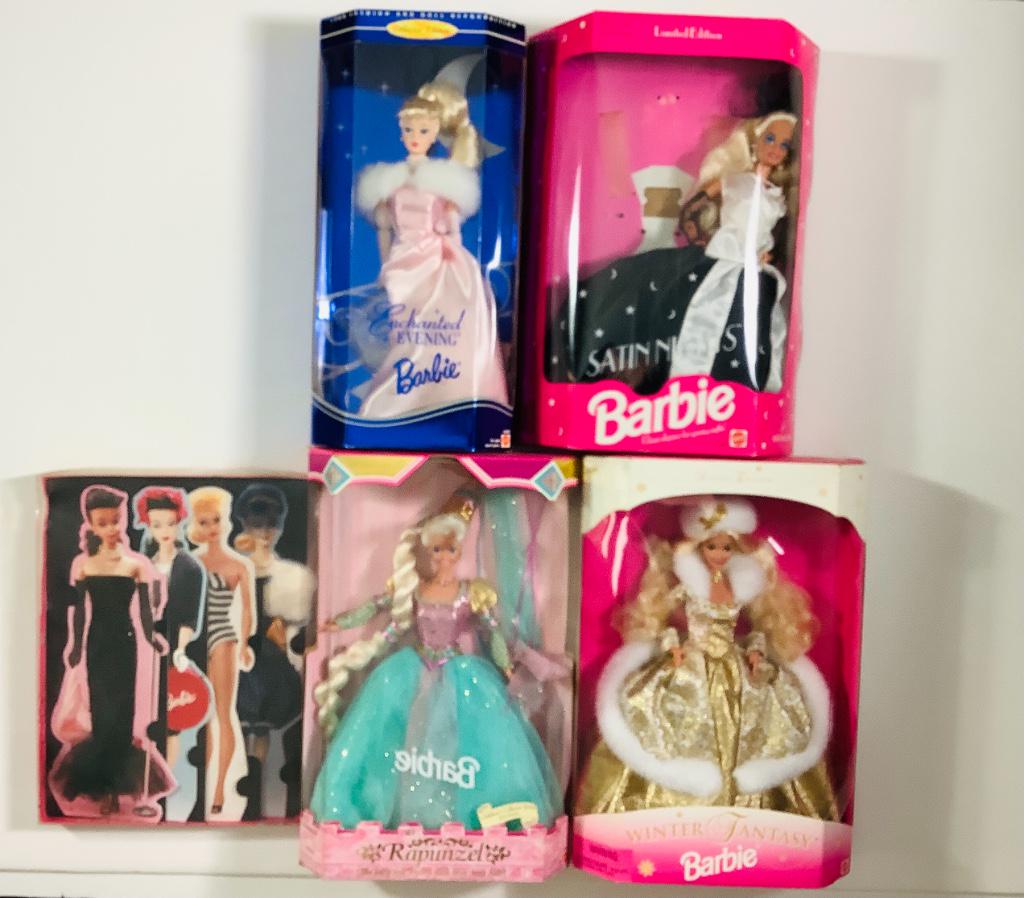 Lot of 4 Barbies including Winter Fantasy, Satin: Lot of 4 Barbies including Winter Fantasy, Satin Nights, Enchanted Evening, Rapunzel and box of Barbie Greeting Cards. Boxes are dusty.
