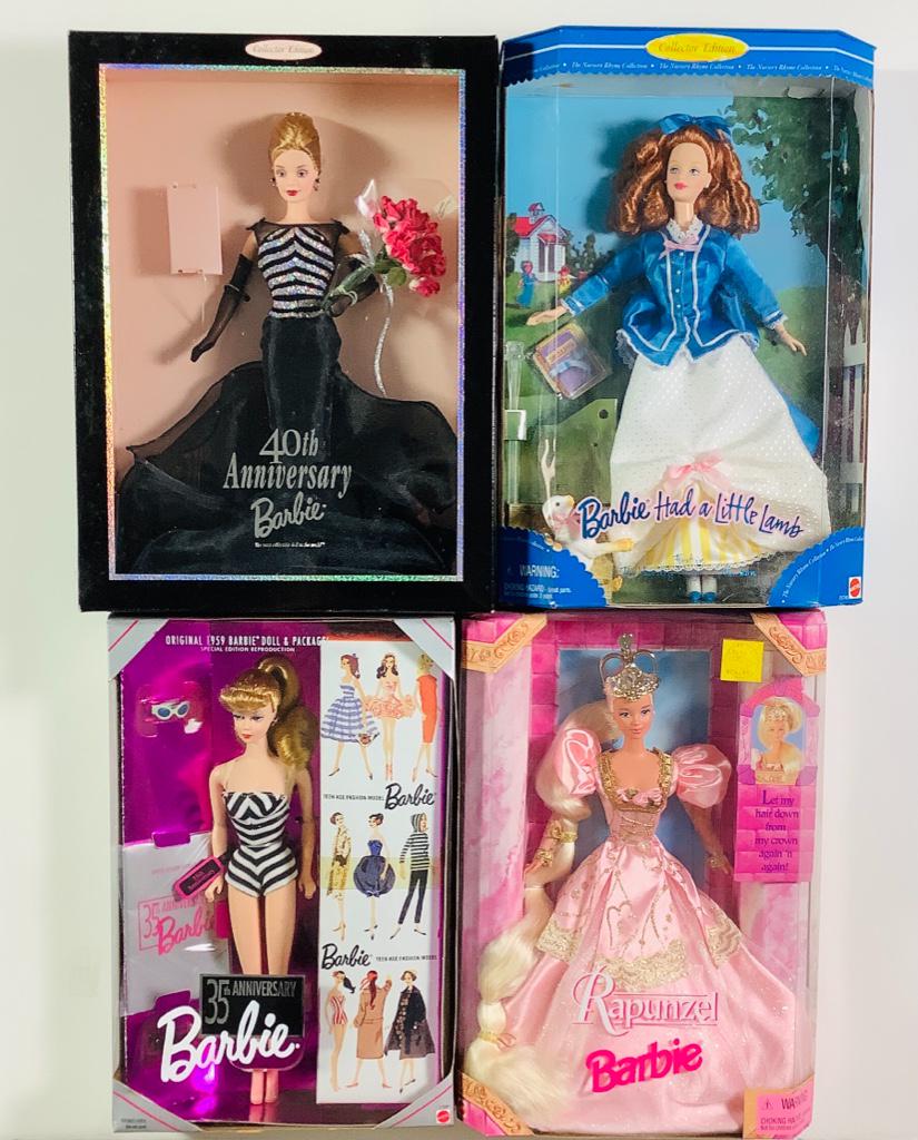 Lot of 4 Barbies including Rapunzel, Barbie Had a: Lot of 4 Barbies including Rapunzel, Barbie Had a Little Lamb, 35th & 40th Anniversary. Boxes are dusty.