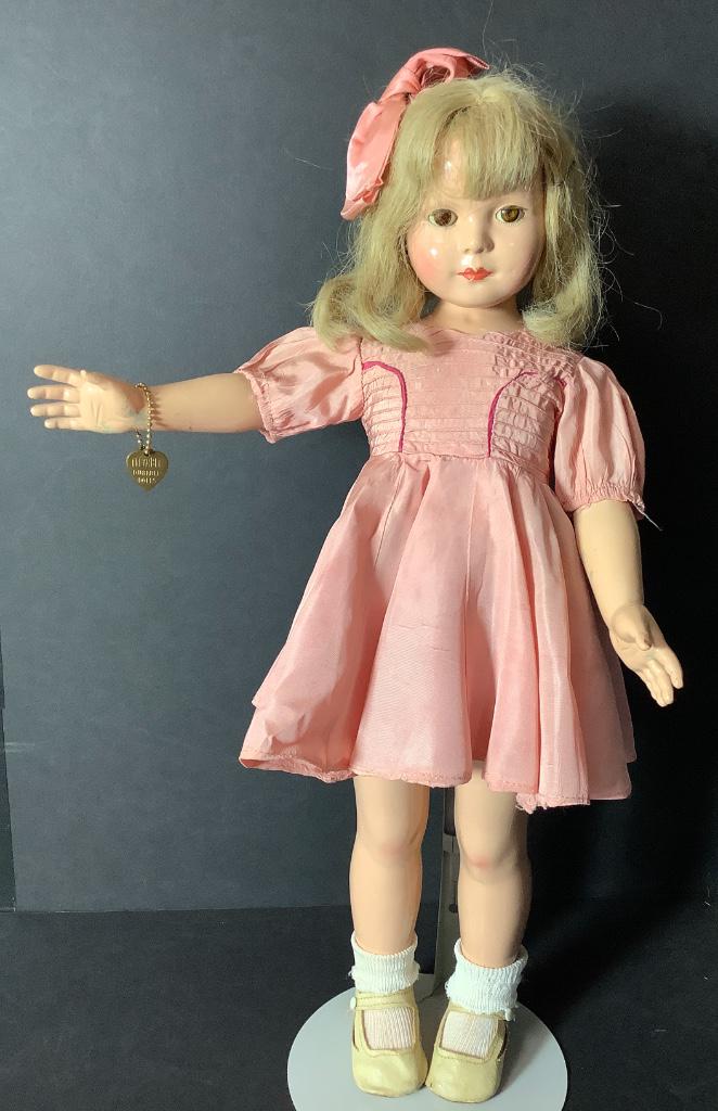 19 1/2" Effanbee American Child designed by Dewees: 19 1/2" Effanbee American Child designed by Dewees Cochran. All composition doll marked "EFFANBEE Anne-Shirley" on her back, human hair wig, sleep eyes, closed mouth, on five-piece body. Dress and und