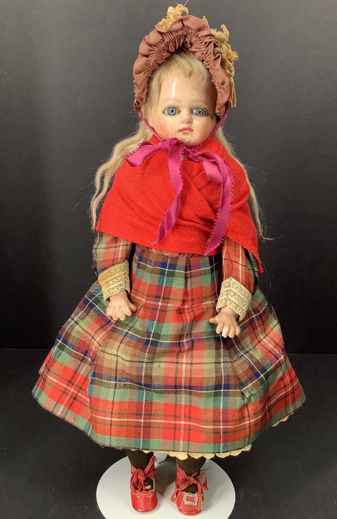 14" Papier Mache shoulder head lady. Mohair wig,: 14" Papier Mache shoulder head lady. Mohair wig, stationary glass eyes, closed mouth, on stitch-jointed cloth body with composition lower arms and legs. Doll has overall wear and crazing, eyes have sc