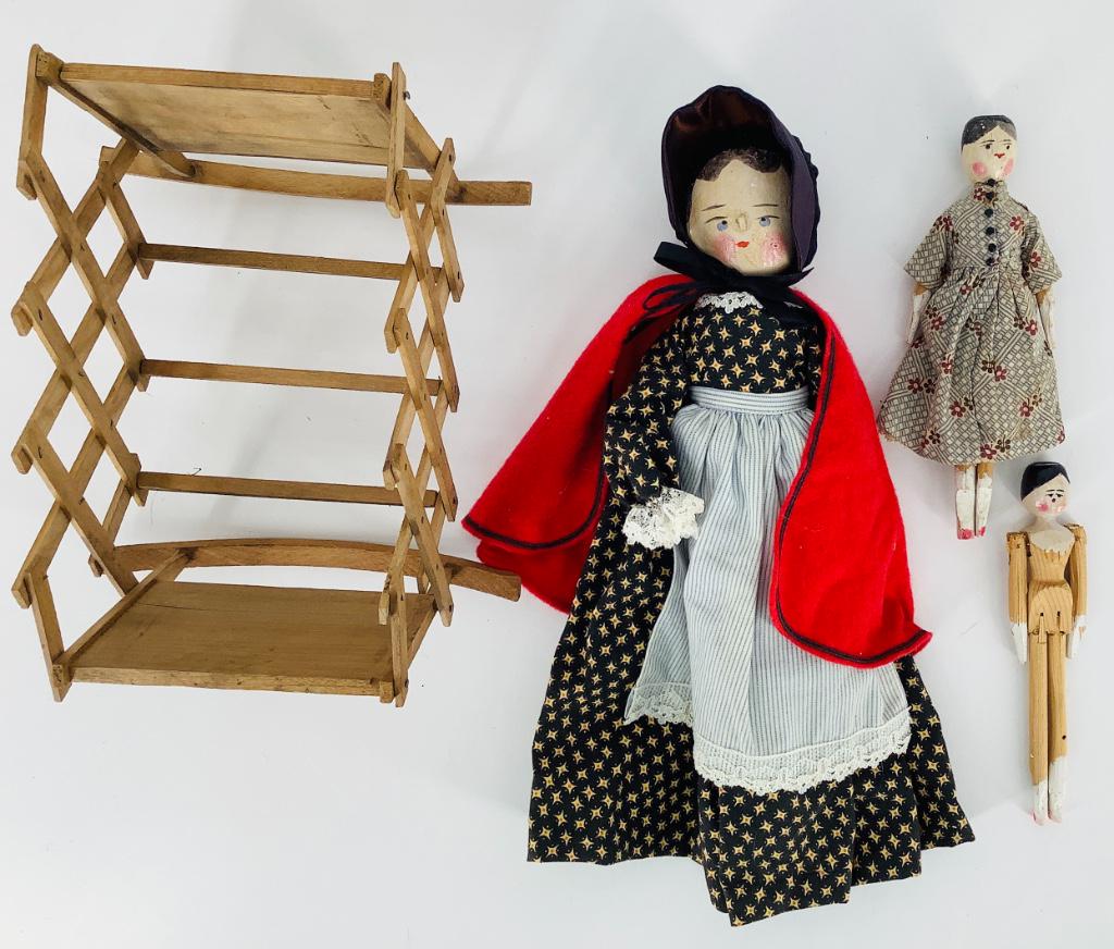 Lot including three vintage peg wooden dolls and a (1 of 2)
